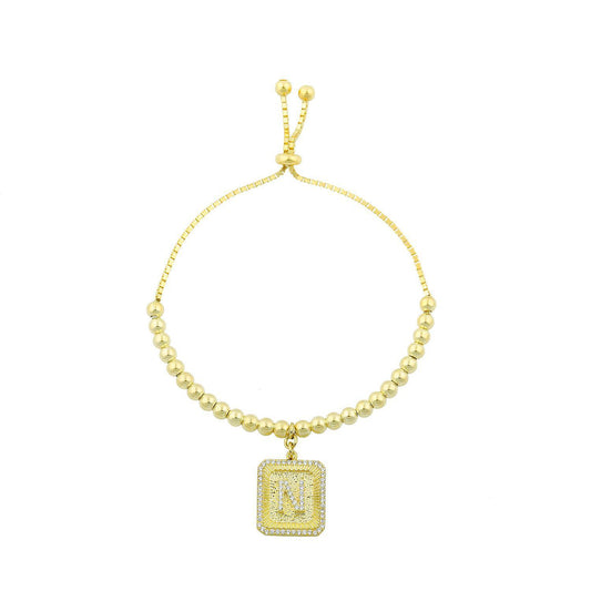 Square Initial Bracelet in Gold JEWELRY The Sis Kiss