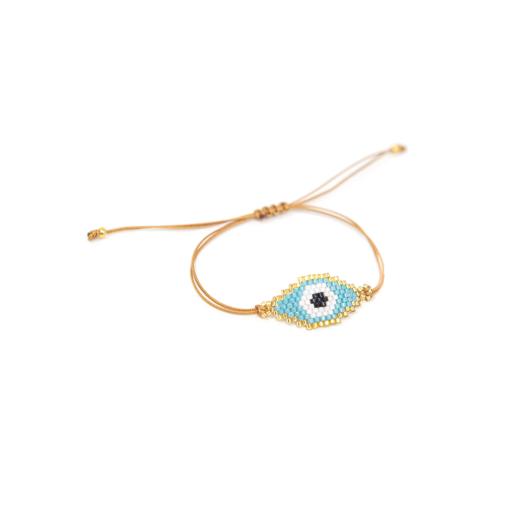 Beaded Evil Eye Adjustable Cord Bracelet JEWELRY The Sis Kiss White Eye on Turquoise Background